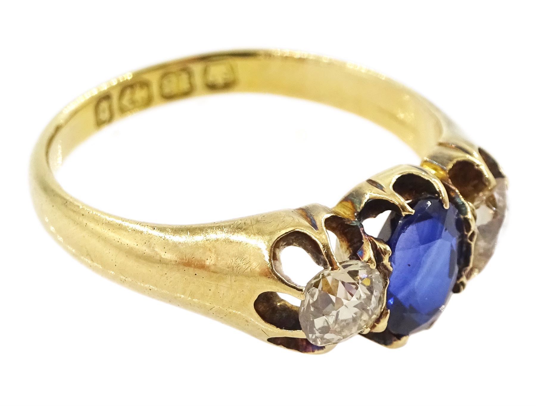 Victorian 18ct gold three stone oval cut sapphire and old cut diamond ring, Birmingham 1895, sapphire approx 0.90 carat, total diamond weight approx 0.55 carat