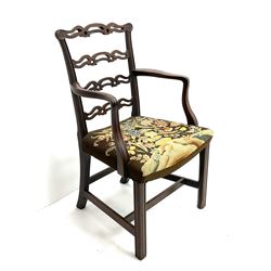 Chippendale style ladder back armchair, shaped reeded arms, supports and stretcher, upholstered in patterned fabric 
