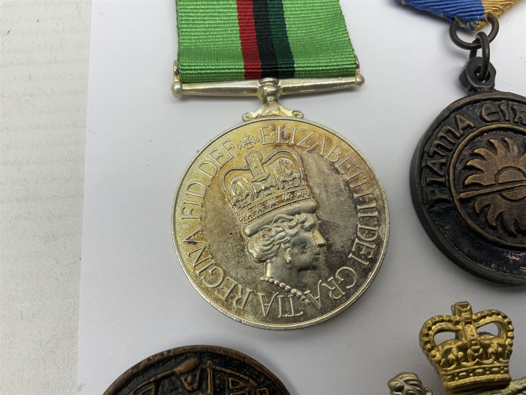 Small collection of Irish related medals, cap badges, buttons, political pin badges etc
