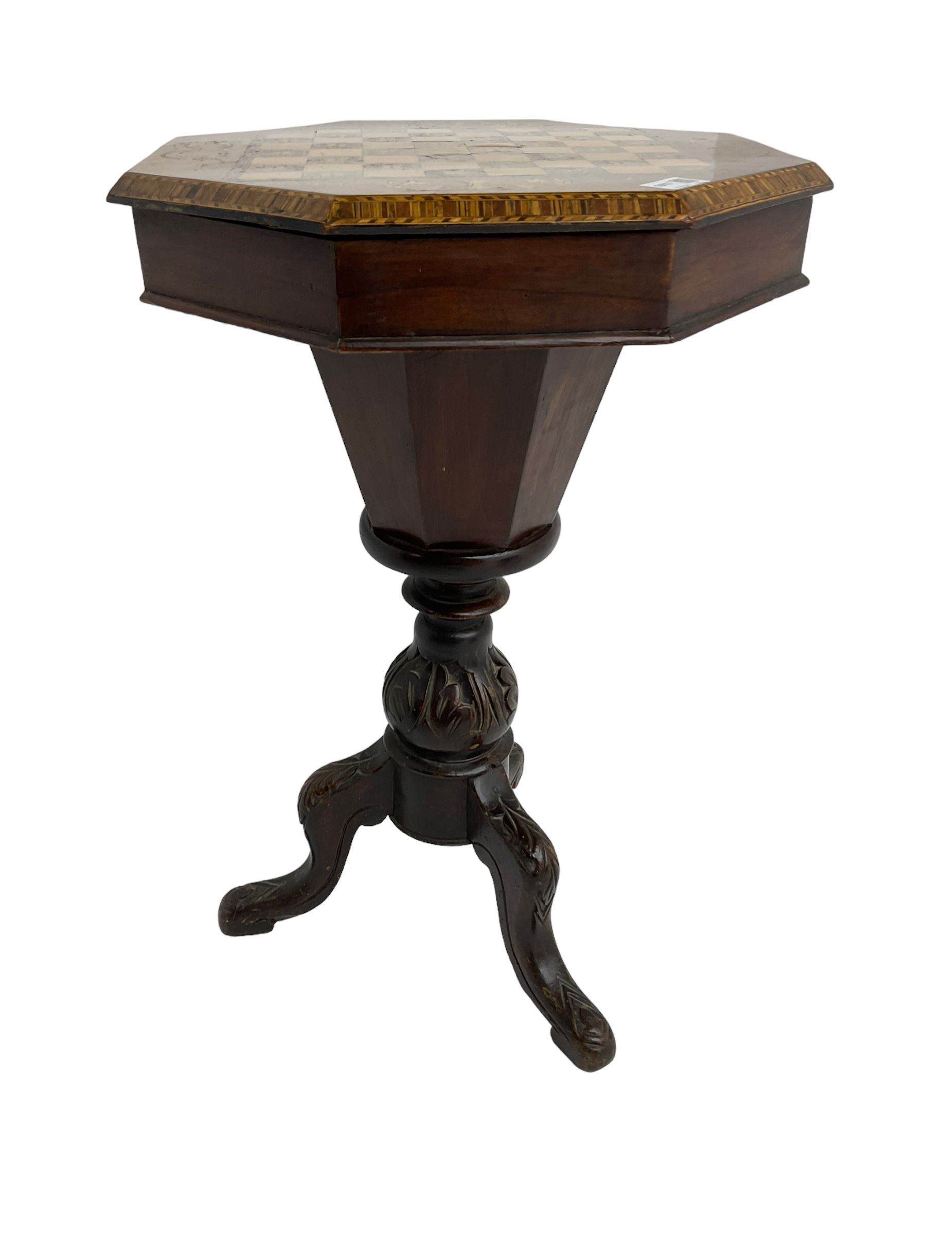Late 19th century inlaid walnut sewing or work table, octagonal hinged top with satinwood and ebony chessboard inlay, surrounded by foliate decoration, the edges inlaid with crossbanding and stringing, fitted interior with chess pieces, raised on baluster pedestal carved with acanthus leaves on a tripod base 