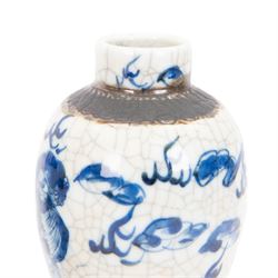 Pair of 20th century Chinese crackle glaze vases, of baluster form, decorated with dogs of foo amongst clouds, H23cm