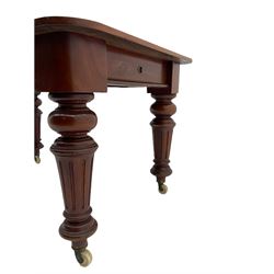 Victorian mahogany extending dining table, with leaf, turned tapering supports on castors, with winding handle