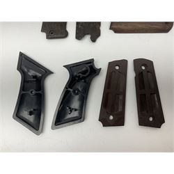 Six pairs of revolver grips;  pair of Lightwood & Son Ltd powder/shot measures in original box; and boxed Colt hammer shroud 