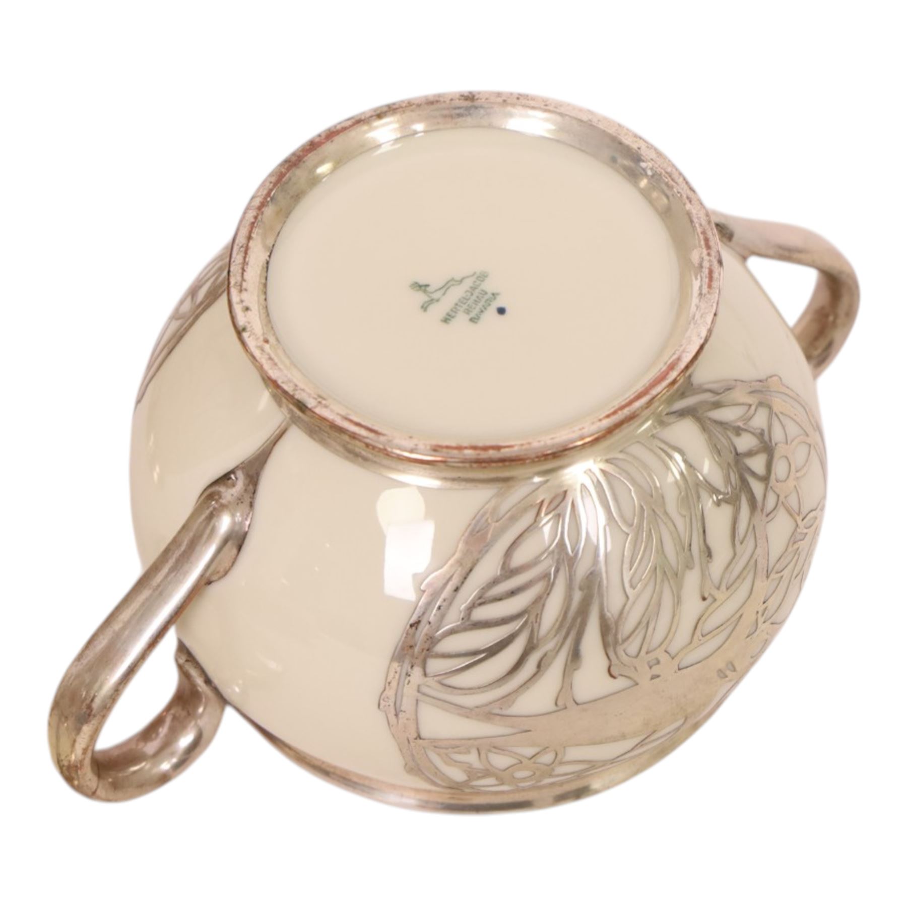 Jacob Hertel Bavarian tea service, decorated with silvered overlay of birds in foliage, comprising teapot, milk jug, covered sucrier three cups and saucers 