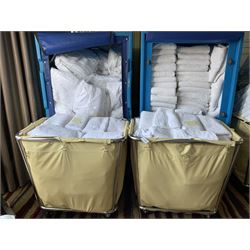 170 regular bath towels, 180 towels, 33 packs of regular towels, with two linen trolleys- LOT SUBJECT TO VAT ON THE HAMMER PRICE - To be collected by appointment from The Ambassador Hotel, 36-38 Esplanade, Scarborough YO11 2AY. ALL GOODS MUST BE REMOVED BY WEDNESDAY 15TH JUNE.