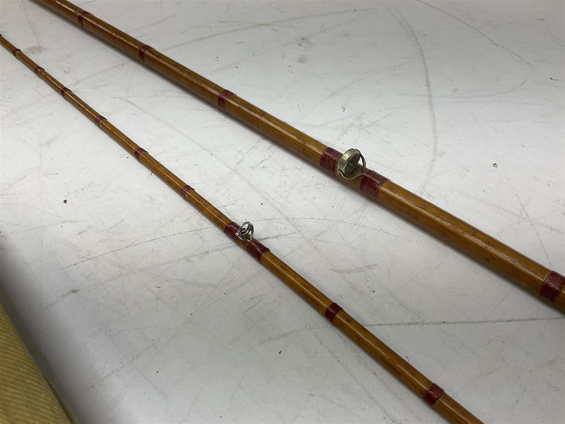 Hardy 'The Sir Edward Grey' two piece split can fishing rod, with cork handle and brass fittings marked Hardys, with a Hardy cover