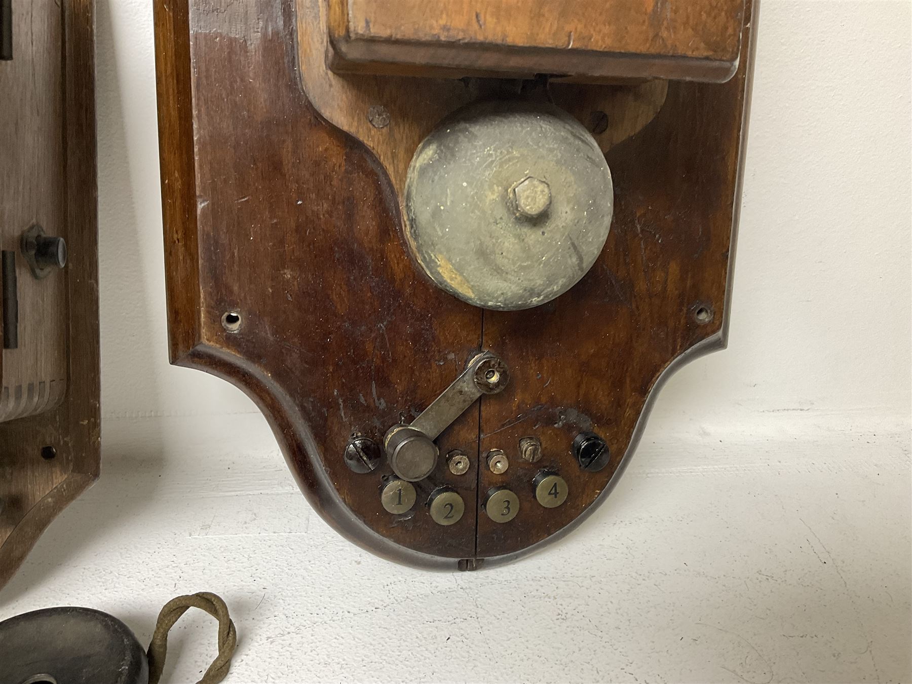 Two Hunningscone patent wall mounting telephones in walnut casing, together with Sterling Telephone & Electric Co. Ltd early wall-mounted telephone 'Primax' and one other 