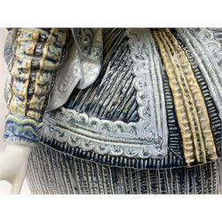 Large Lladro figure, La Menina, modelled as a maid of honor in service, on a mahogany oval base, limited edition 99/1000, sculpted by Jose Puche, with certificate of authenticity, framed and glazed, no 1812, year issued 1996, year retired 2019, H60cm