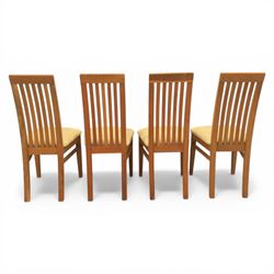 Contemporary teak dining suite comprising extending table and eight chairs, the table with rectangular plank top and one additional leaf extending to 210cm, supported on square tapering legs, the chairs with tall slatted backs and cream upholstered seats