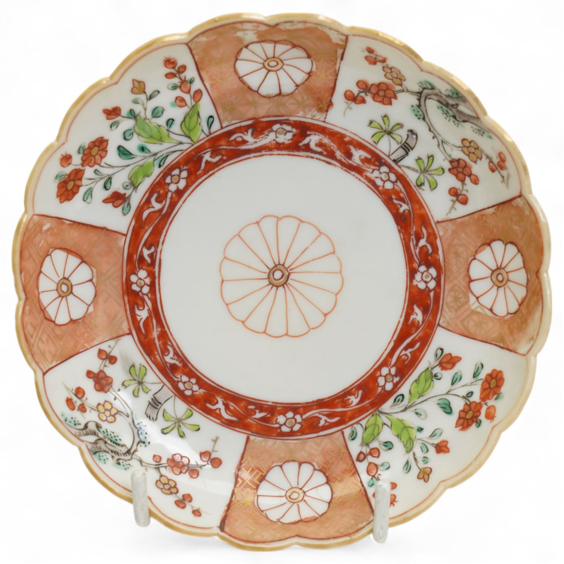Two 18th century Chinese Imari teapots, together with two Imari pattern tea bowls, approximately Kangxi and Qianlong period, and one saucer, one tea bowl with double ring mark to base, largest teapot H16cm (5)