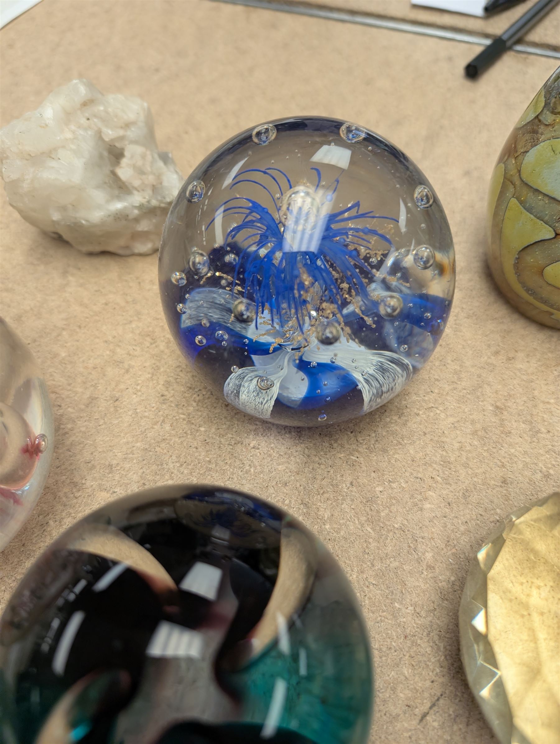 Collection of glass paperweights, including Caithness and Selkirk Glass