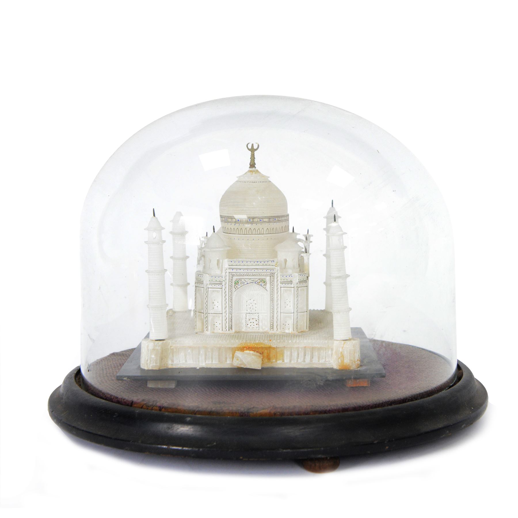 Early 20th century carved alabaster model of the Taj Mahal, early 20th century, under glass dome, raised on a velvet-lined and ebonised plinth, H26cm