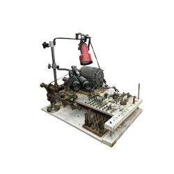 Boley watchmakers lathe with collet chuck, tool rest and tailstock, mounted on a wooden base with motor, lamp, binoculars, various collets and accessories including two dial gauges.