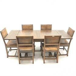 E. Gomme Ltd of High Wycombe oak drawer leaf dining table, two baluster supports joined by single floor stretcher (W190cm, H77cm, D84cm) and set six dining chairs upholstered in a studded antique leather (W51cm)