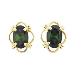 Pair of 9ct gold green tourmaline stud earrings, stamped 