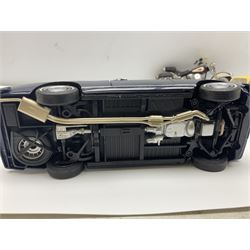 Franklin Mint - three die-cast models comprising 1:10 scale Harley Davidson Heritage Softail motorcycle, 1:24 scale 1957 VW Beetle and 1:24 scale 1993 Rolls Royce Corniche IV; all unboxed (3)