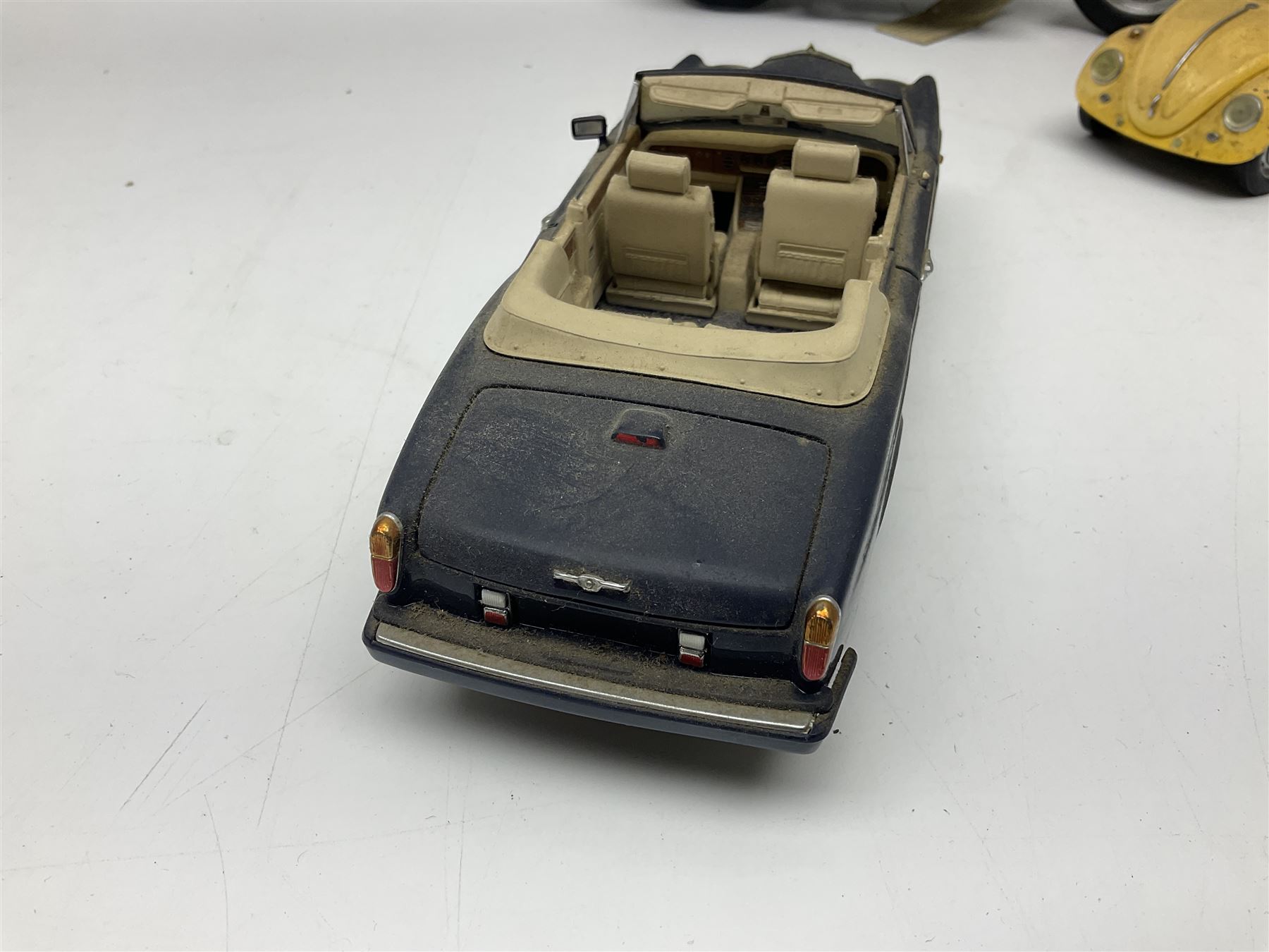 Franklin Mint - three die-cast models comprising 1:10 scale Harley Davidson Heritage Softail motorcycle, 1:24 scale 1957 VW Beetle and 1:24 scale 1993 Rolls Royce Corniche IV; all unboxed (3)