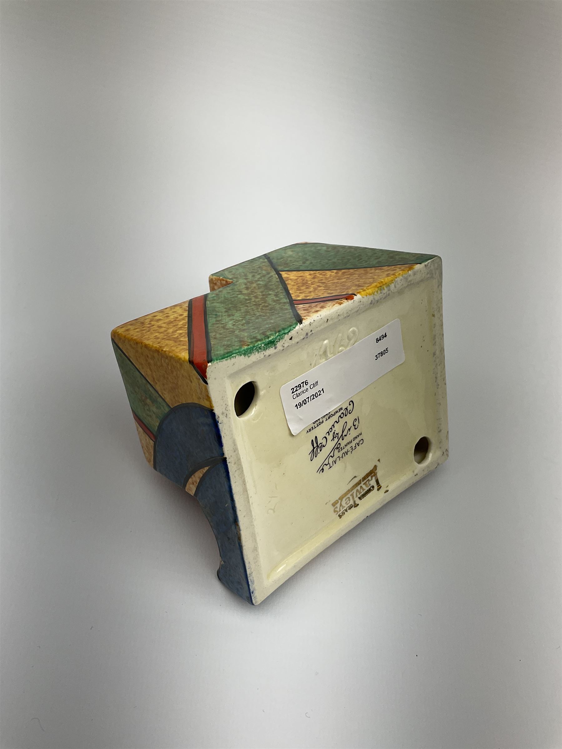 A Clarice Cliff Bizarre Cafe au lait double cube inkwell with pen tray, decorated in the Berries pattern, with printed mark to base, and shape number 462, H7cm W10cm. 