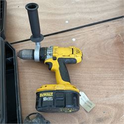 Two DeWalt drills,angle grinder, and light with batteries and attachments in two DeWalt cases  - THIS LOT IS TO BE COLLECTED BY APPOINTMENT FROM DUGGLEBY STORAGE, GREAT HILL, EASTFIELD, SCARBOROUGH, YO11 3TX