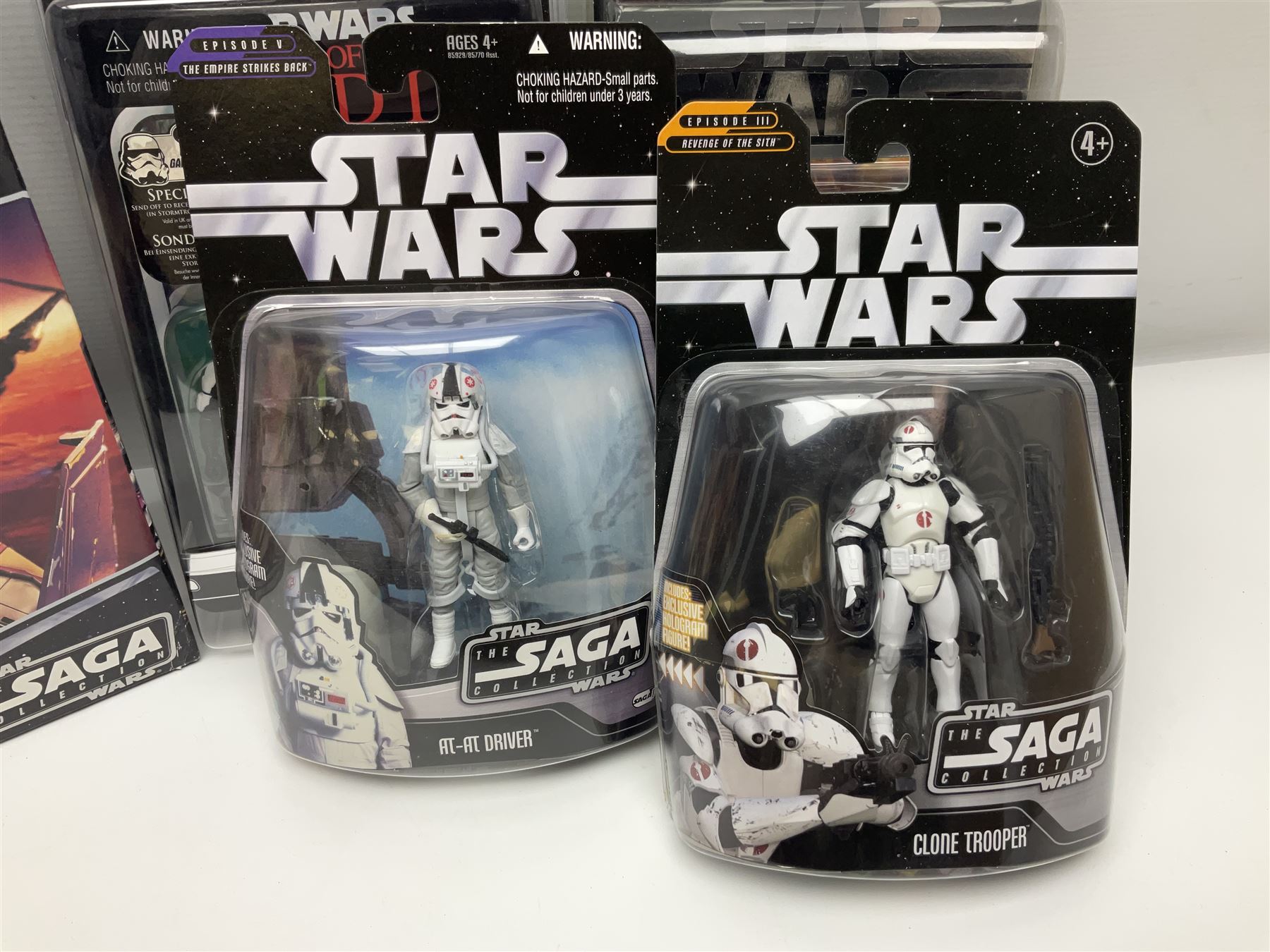 Star Wars - The Saga Collection - Mace Windu's Jedi Starfighter; boxed; and twelve carded figures comprising Biker Scout, General Grievous, At-At Driver, Clone Trooper Sergeant, various other Clone Troopers and Commander Cody, Snowtrooper and Scorch Republic Commander; all in unopened blister packs (13)