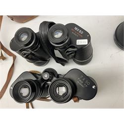 Eleven pairs of binoculars, to include Zeiss Wetzler 20x50, Taylor-Hobson Bino Prism No.2 Mk.III military stamped 1943 with broad arrow,  Swift Tecnar 16x50, J.T Coppock Oceanic Bloomed 10x50, Hensoldt Wetzlar Dialyt 7x42 etc