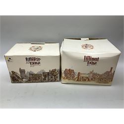 Two limited edition Lilliput Lane cottages, comprising Oakwood Smithy and Blair Athol, both boxed with deeds