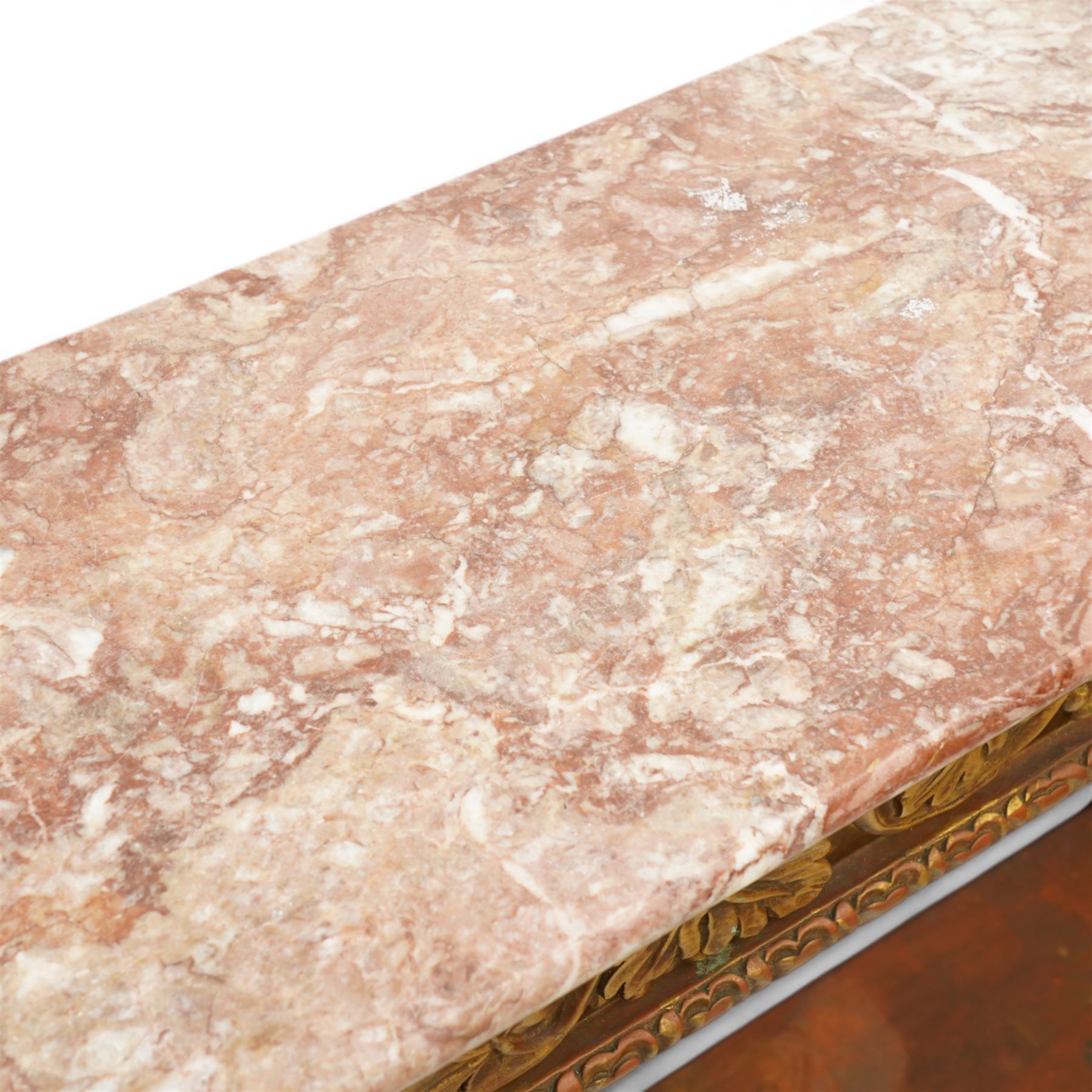 Pair of carved giltwood and composition console or pier tables, rectangular variegated rouge marble top, the frieze decorated with trailing vine and grape bunches, eagle front supports on stepped rectangular base