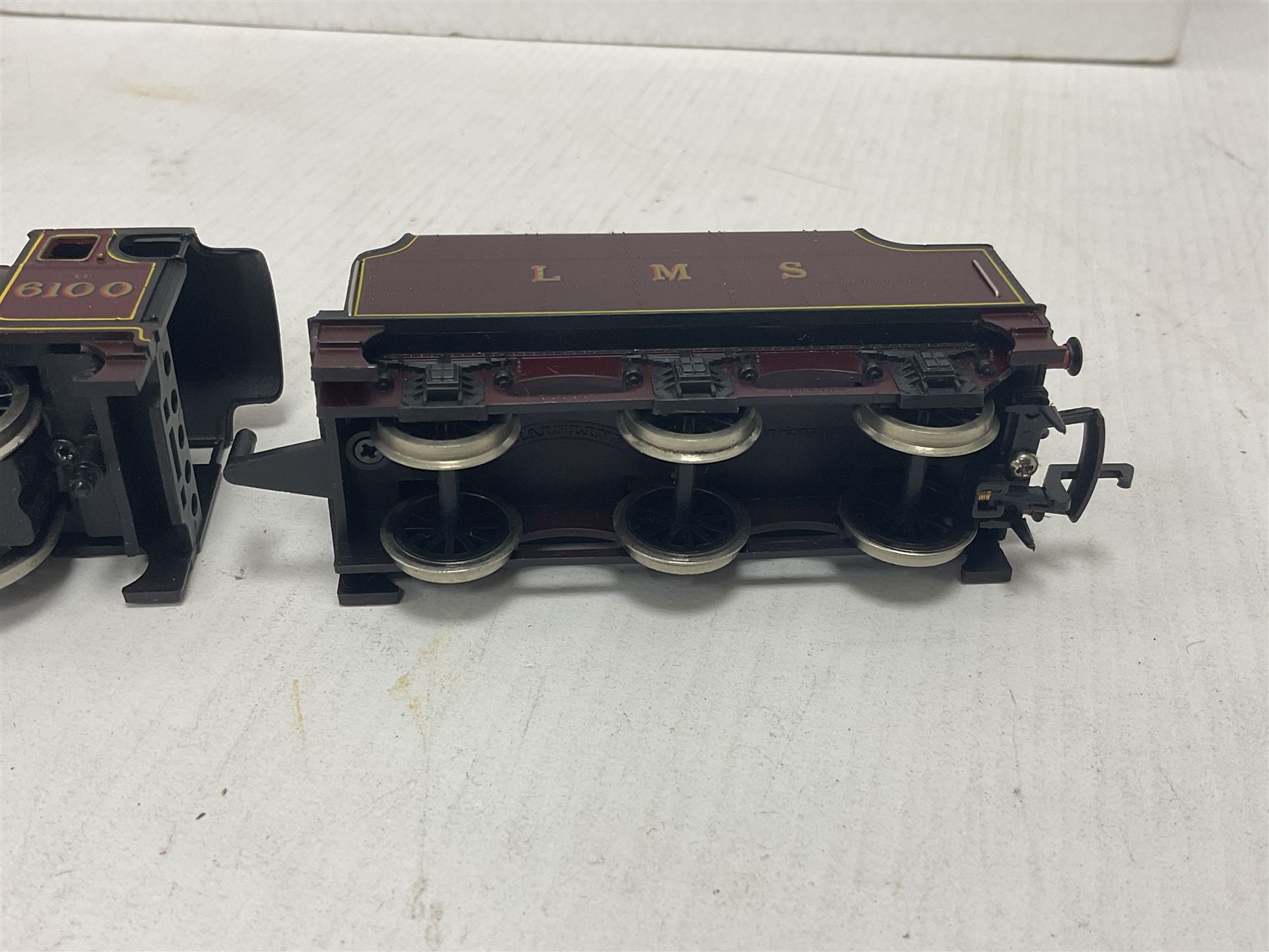 Various makers ‘00’ gauge - four locomotives comprising Mainline Railways ref.37060 Rebuilt Scot Class ‘Royal Scot’ 4-6-0 no.6100 in LMS crimson; Airfix Royal Scot Class ‘Royal Scots Fusiliers’ 4-6-0 no.6103 in LMS black and Class 4F Fowler 0-6-0 no.4454 in LMS black; Lima Class 08 Diesel 0-6-0 Shunting no.7120 in LMS black; all in original boxes (4)