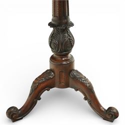 George III style carved mahogany kettle stand, the square top with gadrooned edge above a pull out slide, raised on a turned and carved baluster column issuing three carved cabriole legs terminating in scroll feet