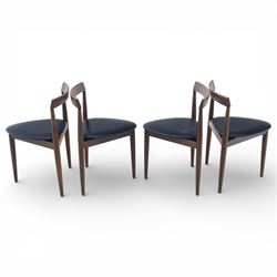 Frem Røjle - Danish teak 'Roundette' extendable dining table, circular top with softly chamfered edge and internal stowable leaf extends to 156cm, raised on four tapered cylindrical legs, accompanied by four matching dining chairs with shaped teak frames and black vinyl upholstered seats, the chairs designed to nest beneath the table when not in use