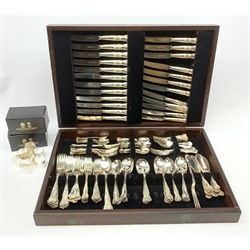 A large mahogany cased silver plated canteen of Kings pattern cutlery, together with two boxed sets of four silver plated napkins. 