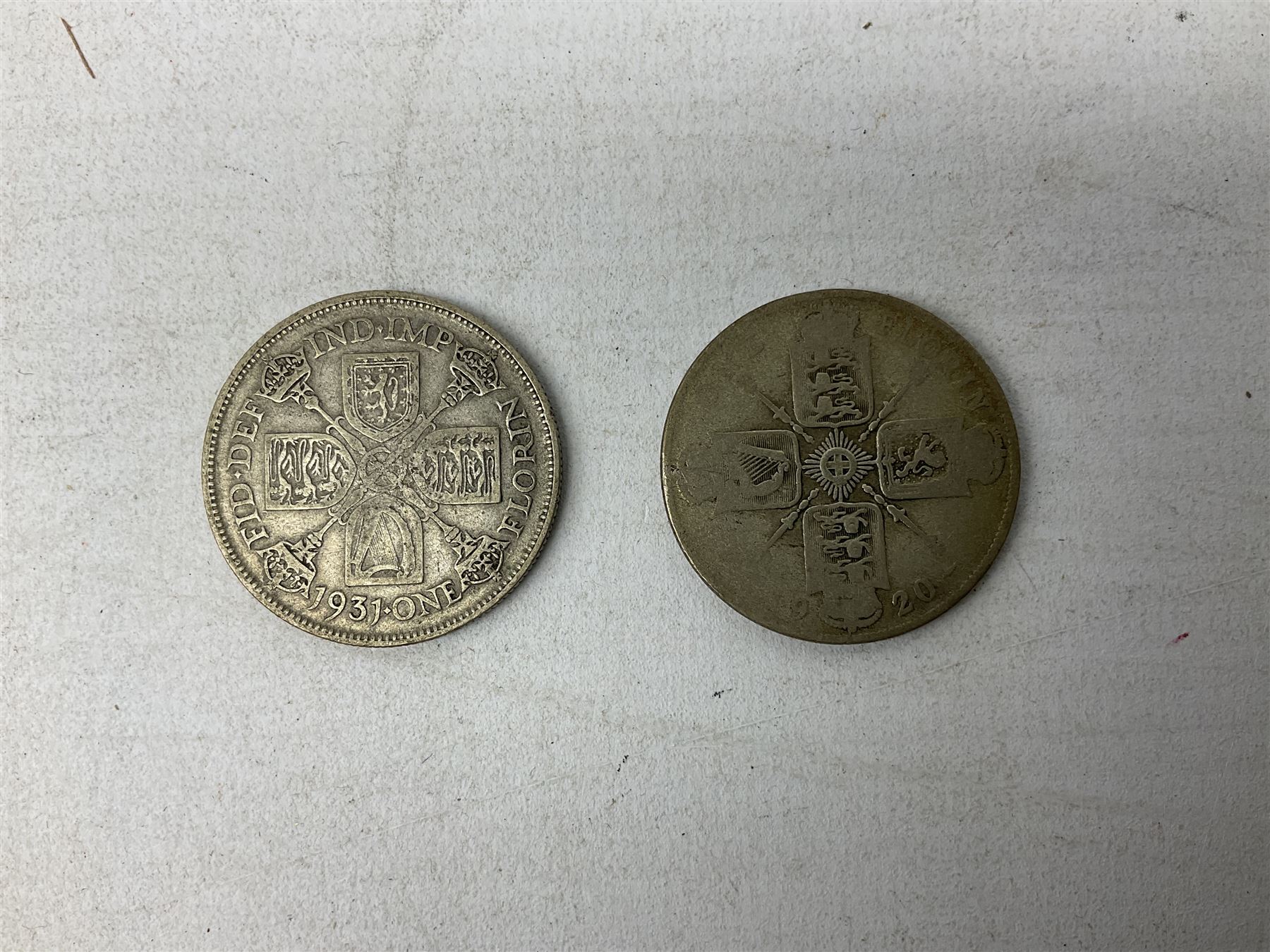 Coins and banknotes, including Lowther mis-printed five pound note 'HH09', Somerset one pound note 'CZ13', United States of America 1971 and 1976 one dollar coins, Great British commemorative crowns, Queen Elizabeth II 1997 two pound coin, 2008 five pound coin, King George V 1920 and 1931  florins and various other pre-decimal coins