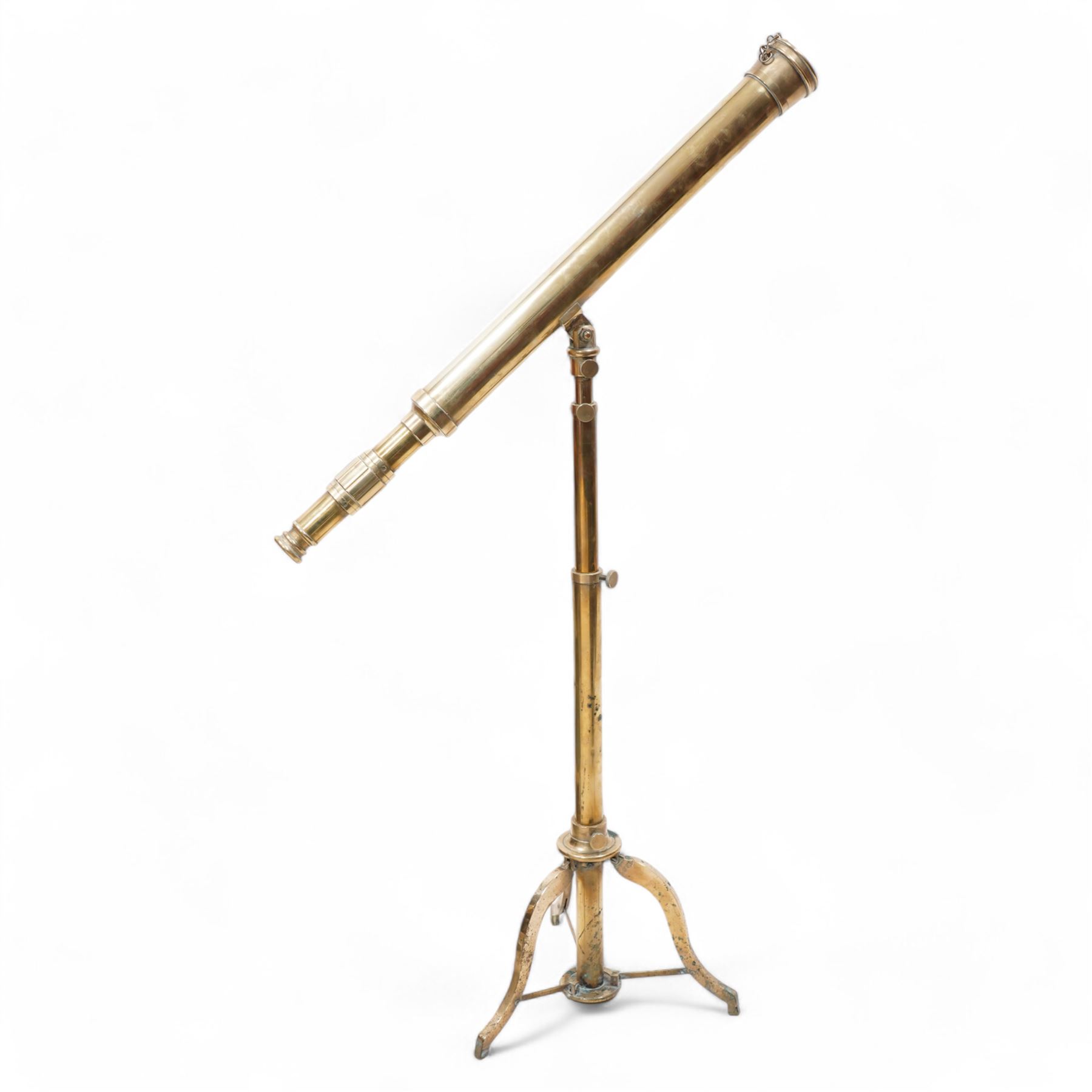 Late 20th-century lacquered brass telescope, the barrel on a telescopic stem, and a tripod stand 
