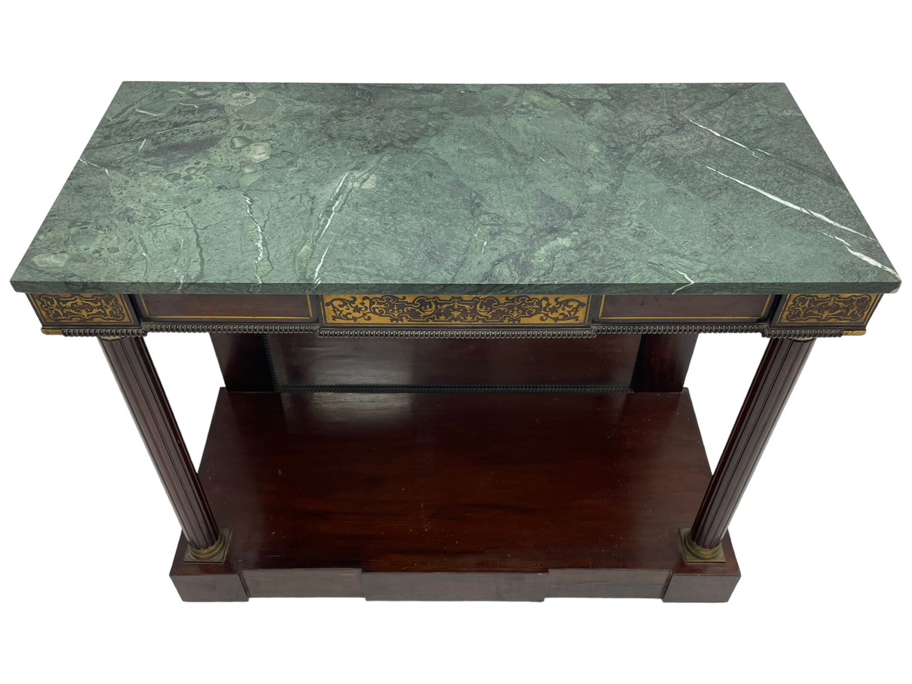 Late 19th century mahogany console or pier table, rectangular green marble top over a break-front frieze inlaid with brass scroll work panels, reed and ribbon gilt metal and wooden beaded applied mouldings, on turned and fluted front supports, plain mirror back over plinth platform base