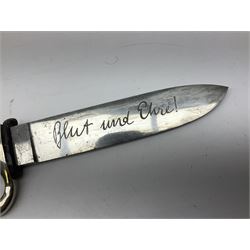 German Hitler Youth dagger the 14cm steel blade by Eickhorn Solingen inscribed Blut und Ehre and marked RZM M 7/66, chequered black grip with inset enamel diamond shaped insignia; in steel scabbard with leather frog L27cm overall