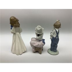 Lladro figure of a girl brushing her hair, together with four Nao figures and Tengra figure