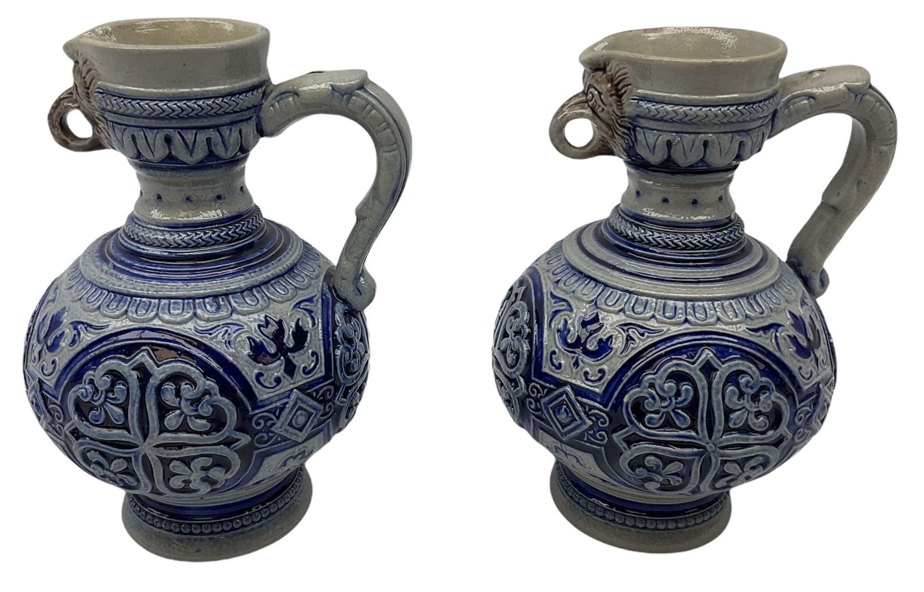 Pair of late 19th Century German Simon Peter Gerz salt glaze stone jugs, impressed mark to base, model number 550, H15cm
