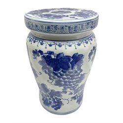  Oriental style blue and white ceramic garden seat, decorated with fruiting vines, H40.6cm