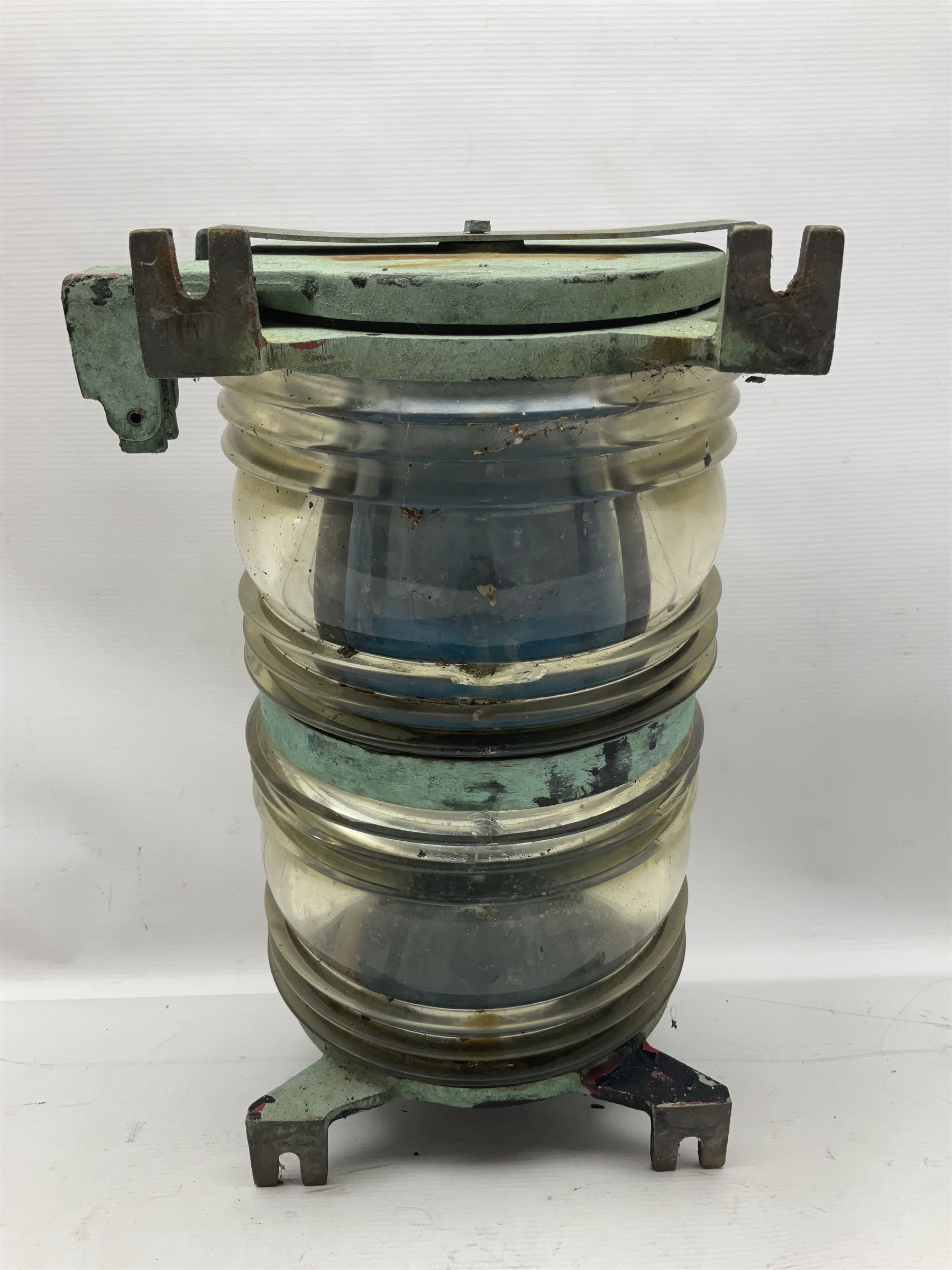 Two port and starboard brass lamps, each with a plaque marked 'Noack as Lanterne KL.A Serie 700 Type 704D Babord', ribbed green and red glass shades, H44cm