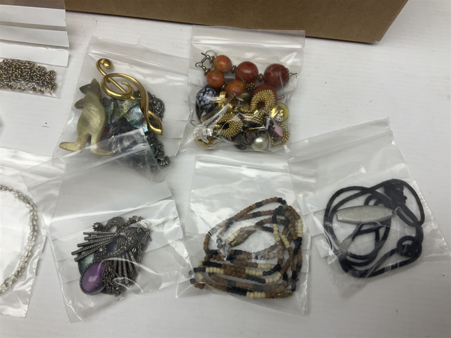 Silver necklace, compact mirror with lipstick holder and a collection of costume jewellery 