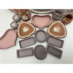 Collection of Wedgwood Jasperware, in orange, lilac and pink colourways, including oval tray, small jug, trinket boxes, trinket dishes, etc , all with impressed mark beneath