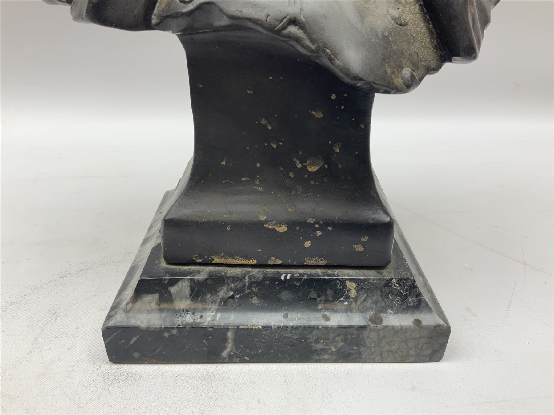 Bronze bust modelled as Napoleon, head and shoulders, wearing his hat and with open collar, on a tapering square section base, marked to the reverse 'Lecomte '82', H36cm