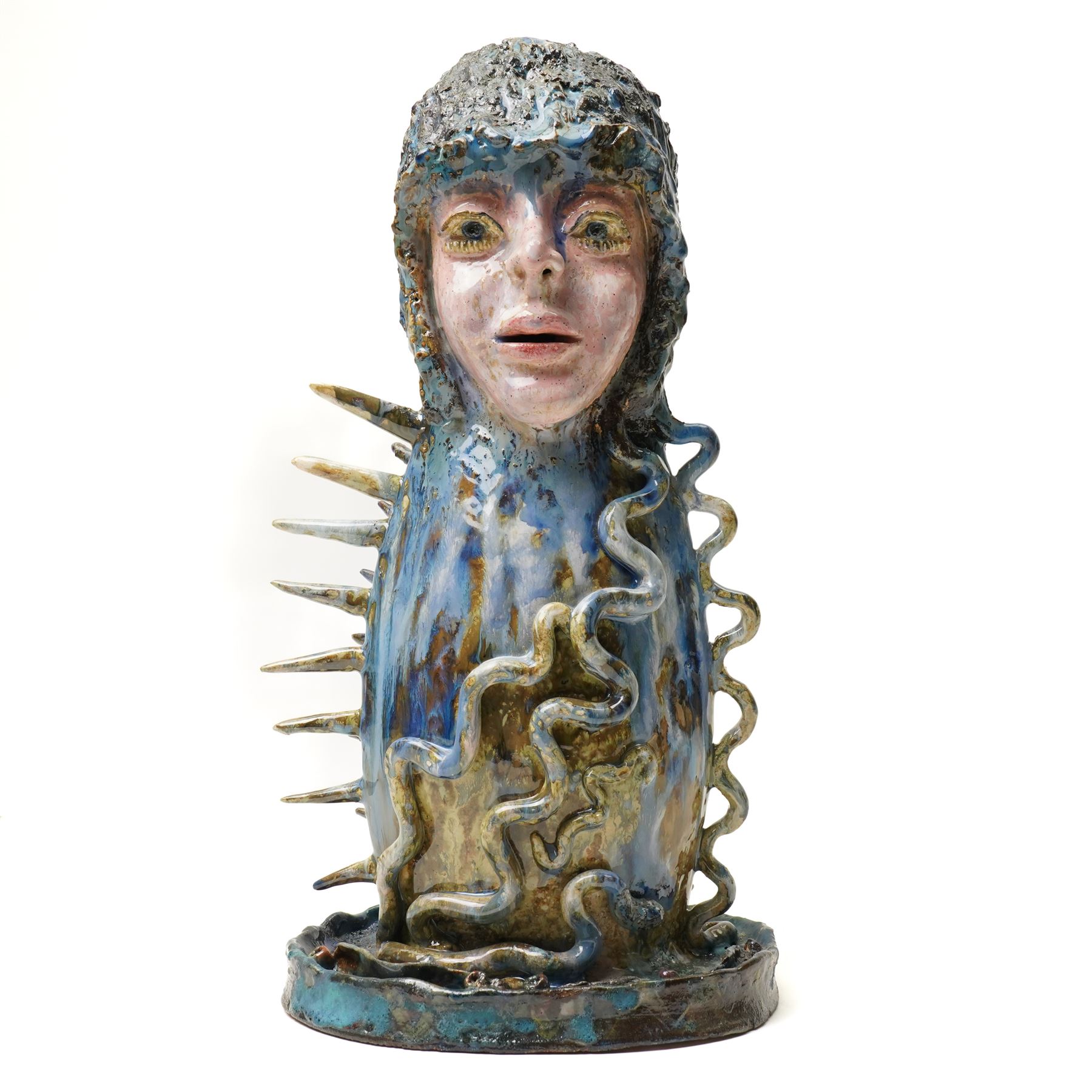 Galea Belinscaia (Yorkshire Contemporary): 'The Mermaid', two faced blue and green glazed figurative sculpture, H42cm 
Notes: Awarded second prize in the 2019 Bradford Open exhibition and Art Competition judged by John Loker and Caroline Douglas. The sculpture was complimented for its tremendous presence, with the judges noting that Belinscaia's work is 'witty, inventive and wonderfully dynamic.'