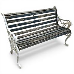 White painted cast iron slatted garden bench