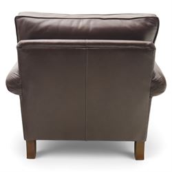 Laura Ashley - brown leather armchair and foot stool, loose cushion back and seat, flanked by scrolled arms upon light stained wood supports on castors, matching brown leather footstool with four panel top over light stained supports on castors (Footstool H 31cm, W 52cm)