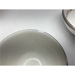 Royal Doulton Pastorale pattern dinner service for twelve, to include dinner plates, side plates, soup bowls, bowls, sauce boat and saucer, two covered dishes 