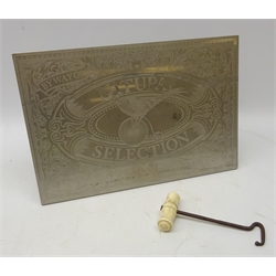  'Natural Selection' engraved metal advertising stand, L42cm x H28.5cm and 19th century bone handled boot pull   