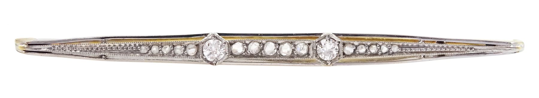 Early 20th century diamond set marquise shaped brooch, two round cut diamonds with rose cut cut diamonds set between
