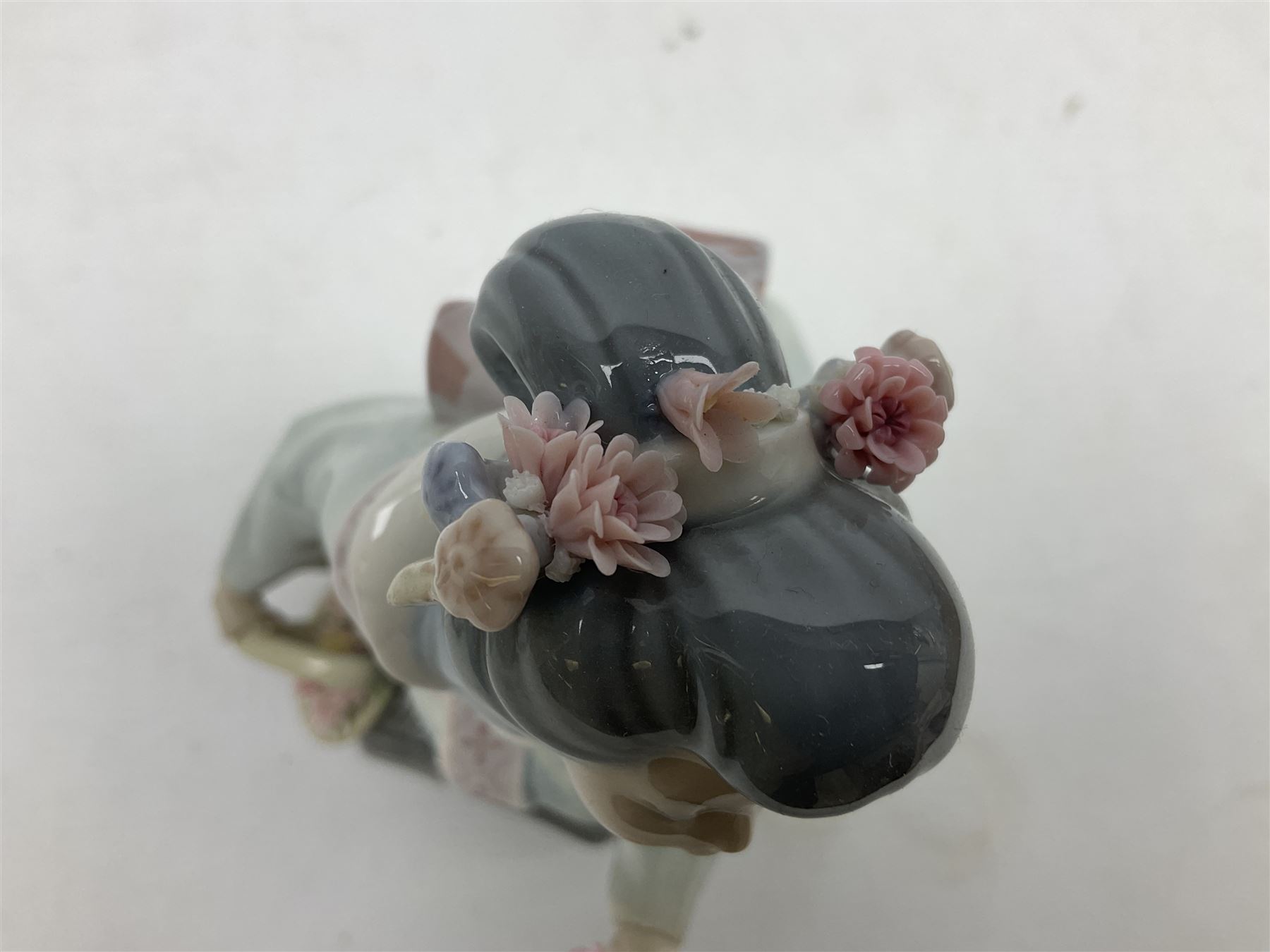 Two Lladro Japanese Ladies figures, comprising Kiyoko no 1450 and Yuki no 1448, both issued 1983, retired 1998, largest example H20cm