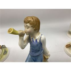 Seven Royal Doulton figures from the Nursery Rhymes Collection comprising, Tom Tom, the piper's son HN3032, Little Jack Horner HN3034, Wee Willie Winkie HN3031, Polly, put the kettle on HN3021, Little Bo-peep HN3030, Little Boy Blue HN3035, Little Miss Muffet HN2727, together with two Royal Doulton Mary had a little lamb figures HN2048 and COPR1948, all with printed marks beneath  